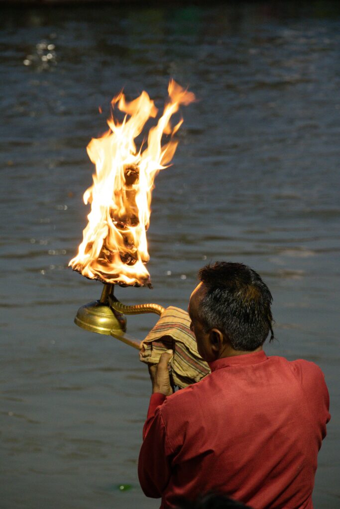 Experience the spiritual essence of the Ganga Aarti ritual by the river in Haridwar, India.